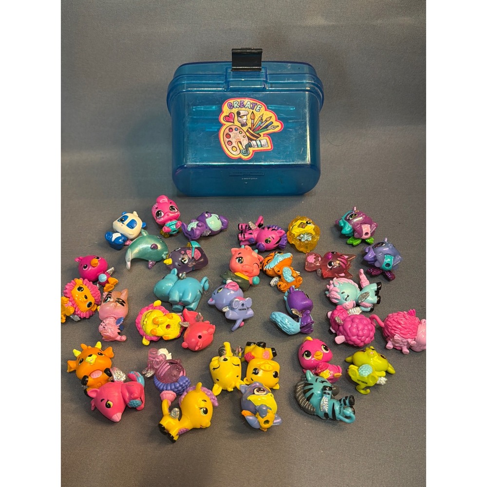 Hatchimals CollEGGtibles Lot of 33 Figures with Blue Storage Case Case Glitter